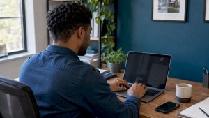 Real estate agent composing an email campaign